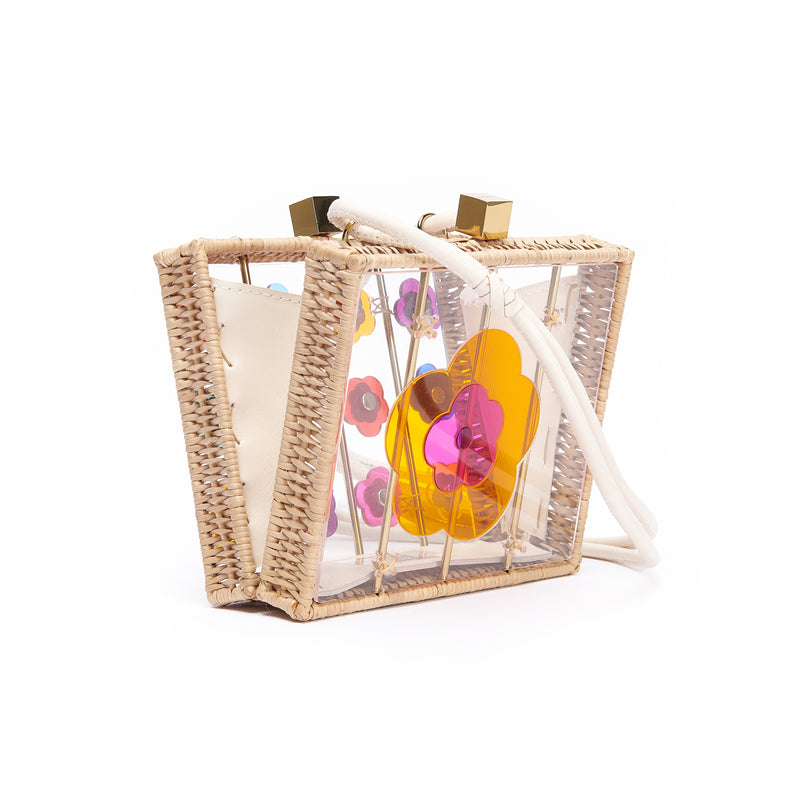 Bolsa estruturada em material transparente, alça curta e flores coloridas em acrílico com acabamento em cristal.