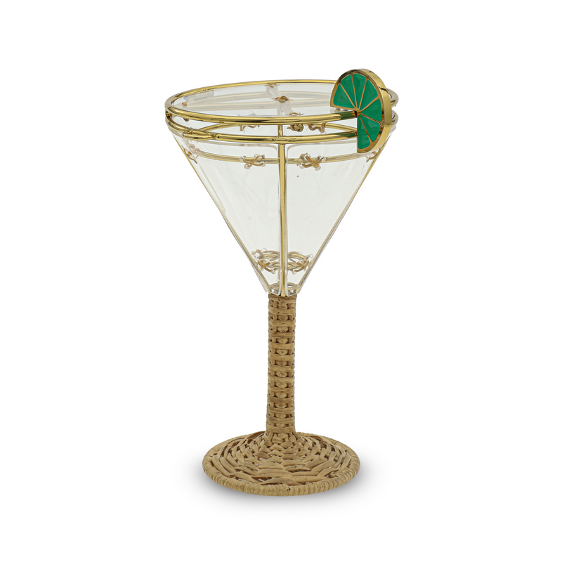 Taça em acrílico transparente com estrutura em metal dourado, base e haste em rattan trançado, detalhe de limão verde aplicado na borda.
