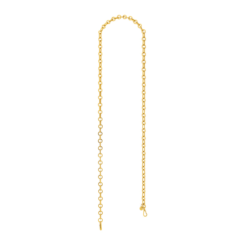Alça removível em metal dourado, com elos alongados e arredondados intercalados. Possui mosquetões dourados nas extremidades para fixação em bolsas.